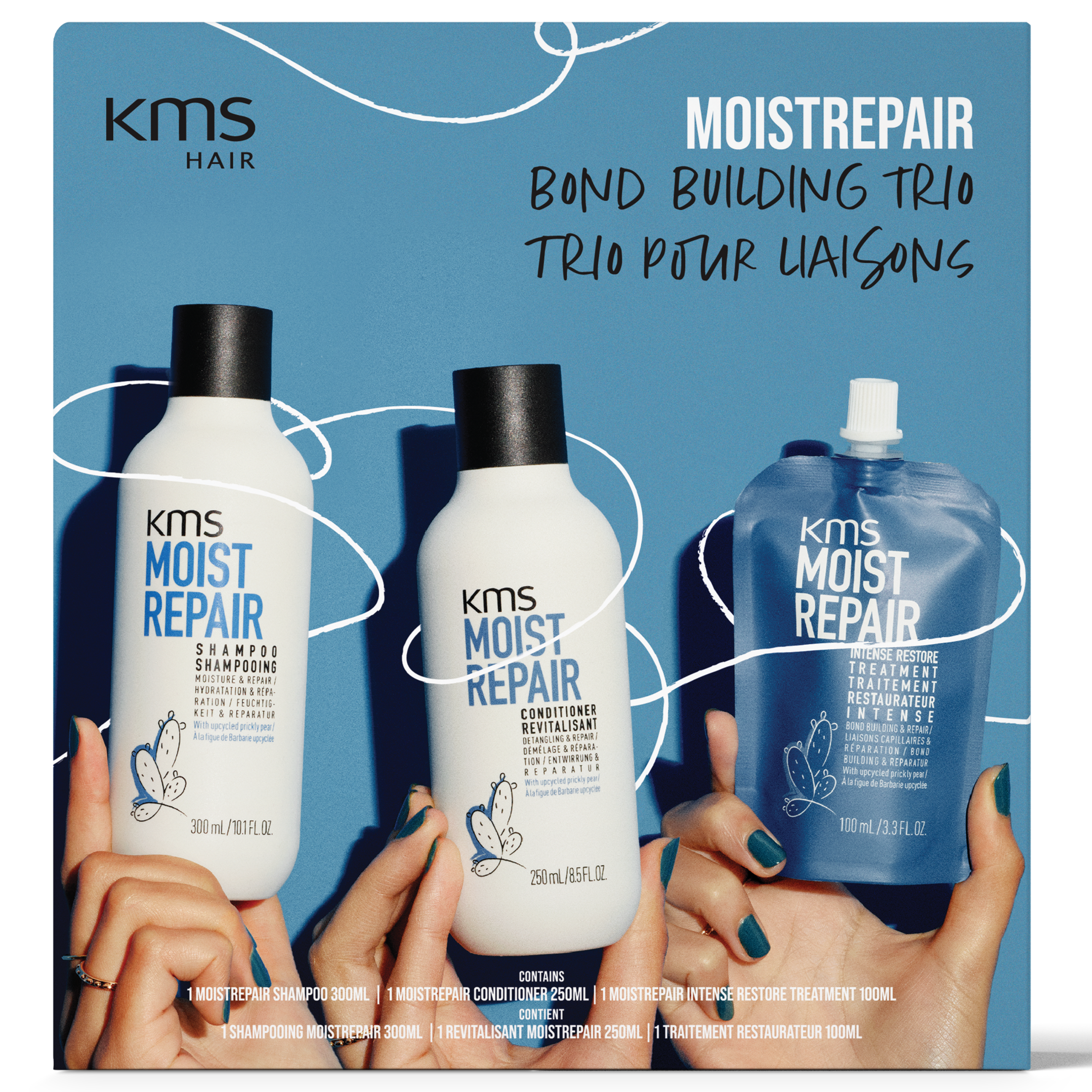 KMS Moistrepair hair care product set with bottles and packaging on a white background