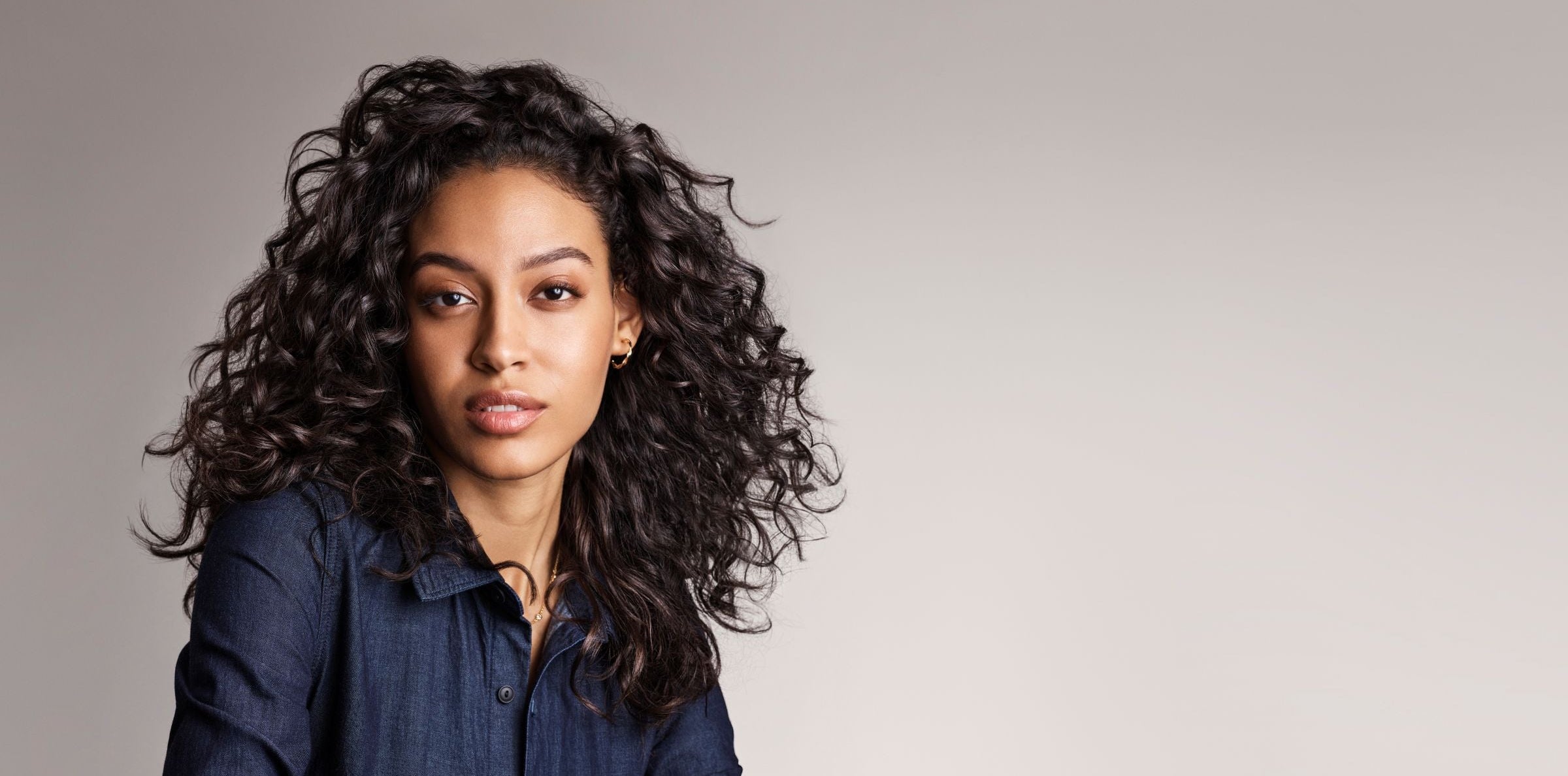 Curl definition guide featuring soft, defined curls with natural movement and reduced frizz