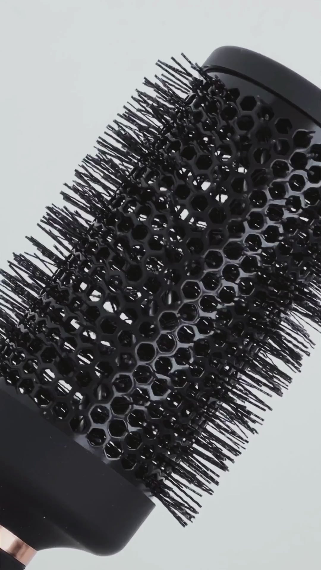 VARIS round brush creating smooth, voluminous blowout
